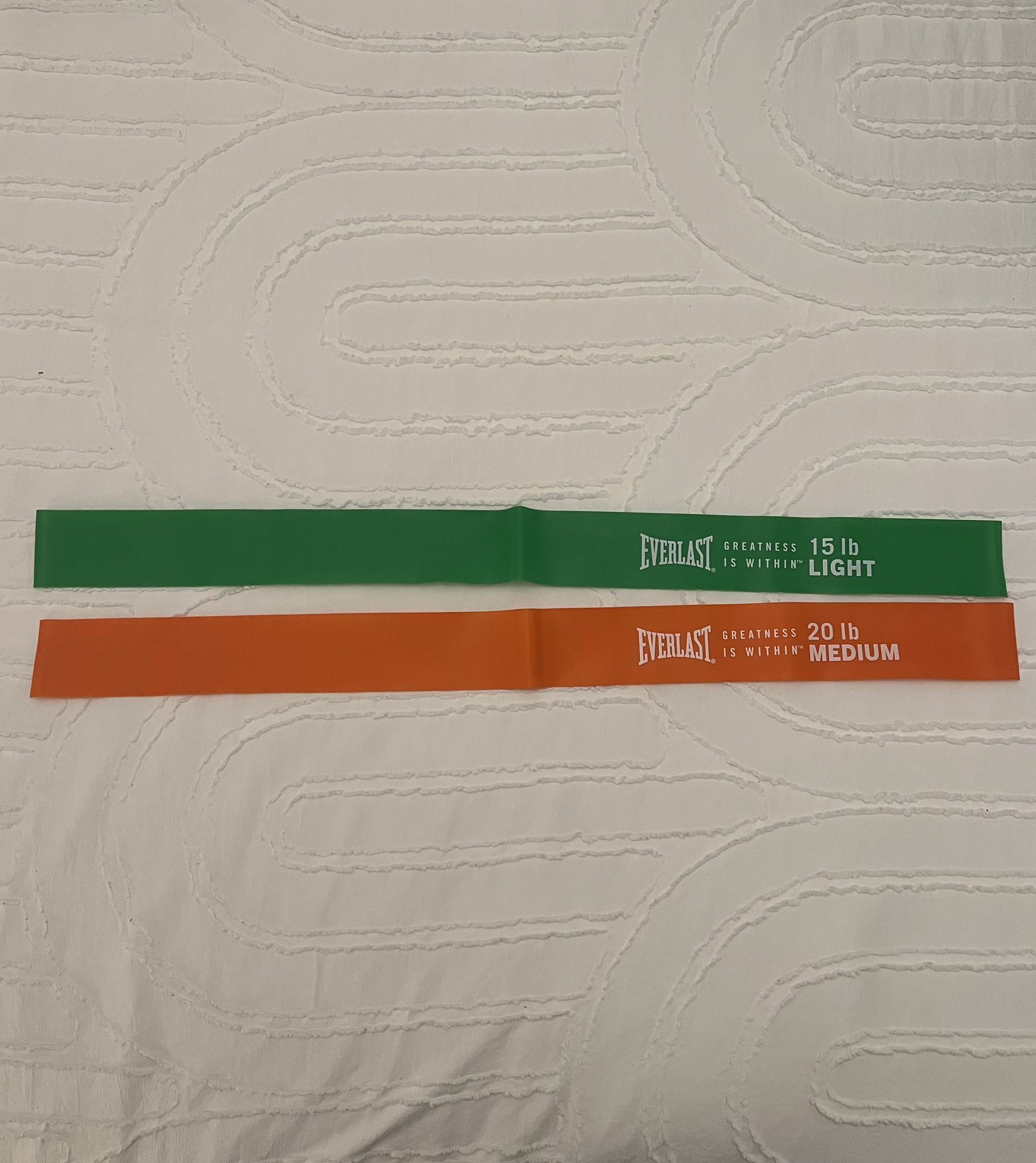 Since the resistant bands are in a loop, I decided to cut two of them so I could glue them together.